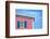 Architecture Detail of a Pink House with Blue Shuttered Window against Blue Sky-pink candy-Framed Photographic Print