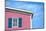 Architecture Detail of a Pink House with Blue Shuttered Window against Blue Sky-pink candy-Mounted Photographic Print