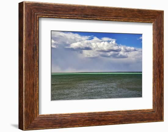 Argentina, Santa Cruz. Puerto Santa Cruz, river Santa Cruz under stormy clouds.-Michele Molinari-Framed Photographic Print