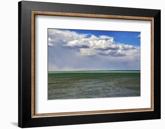 Argentina, Santa Cruz. Puerto Santa Cruz, river Santa Cruz under stormy clouds.-Michele Molinari-Framed Photographic Print