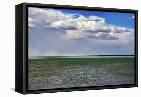 Argentina, Santa Cruz. Puerto Santa Cruz, river Santa Cruz under stormy clouds.-Michele Molinari-Framed Premier Image Canvas
