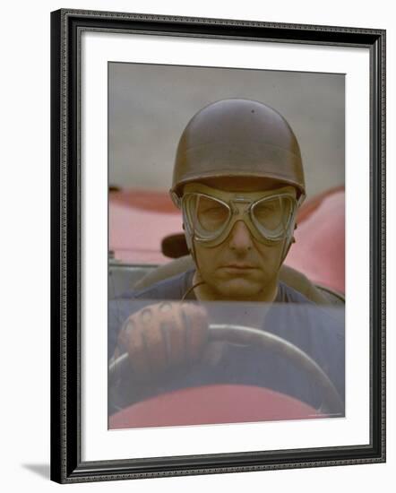 Argentine Auto Racer Juan Manuel Fangio Sitting at Wheel of Race Car at Las Mans-Howard Sochurek-Framed Premium Photographic Print