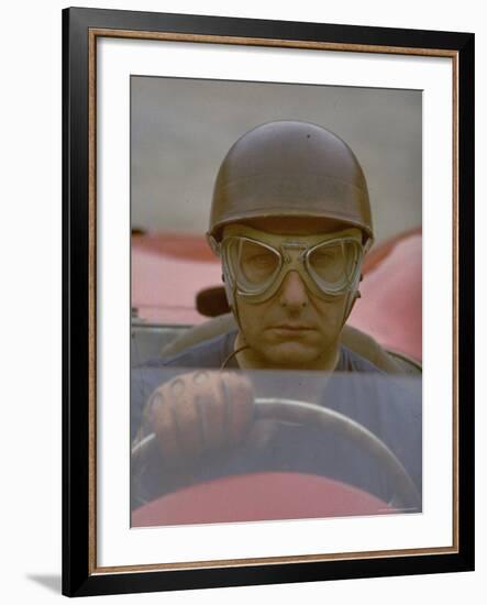 Argentine Auto Racer Juan Manuel Fangio Sitting at Wheel of Race Car at Las Mans-Howard Sochurek-Framed Premium Photographic Print