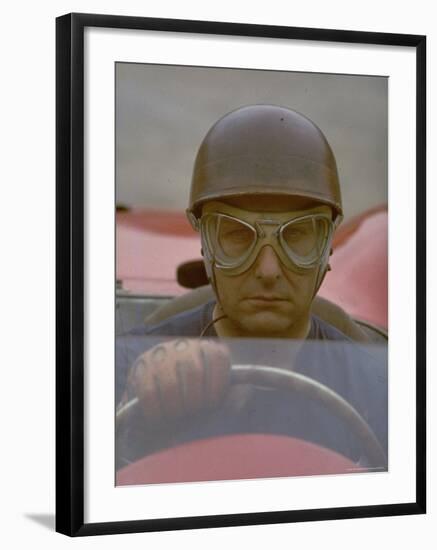 Argentine Auto Racer Juan Manuel Fangio Sitting at Wheel of Race Car at Las Mans-Howard Sochurek-Framed Premium Photographic Print