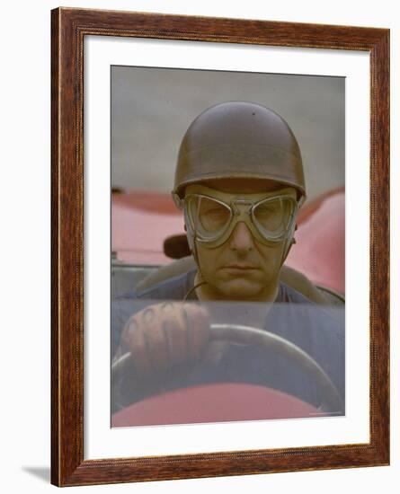 Argentine Auto Racer Juan Manuel Fangio Sitting at Wheel of Race Car at Las Mans-Howard Sochurek-Framed Premium Photographic Print