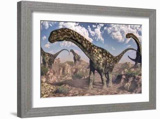 Argentinosaurus Dinosaurs Walking in the Rocky Desert-Stocktrek Images-Framed Art Print