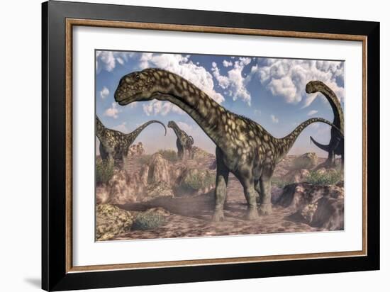 Argentinosaurus Dinosaurs Walking in the Rocky Desert-Stocktrek Images-Framed Art Print