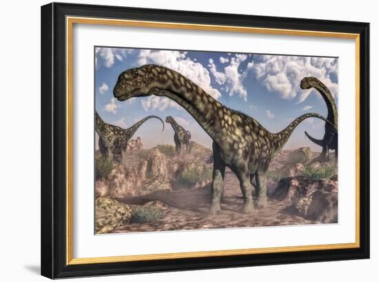 Argentinosaurus Dinosaurs Walking in the Rocky Desert-Stocktrek Images-Framed Art Print