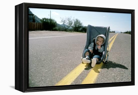 Arizona Junior RAISING ARIZONA by Joel Coen and Ethan Coen, 1987 (photo)-null-Framed Stretched Canvas