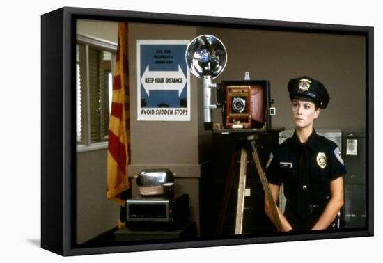 Arizona Junior RAISING ARIZONA by Joel Coen and Ethan Coen with Holly Hunter, 1987 (photo)-null-Framed Stretched Canvas