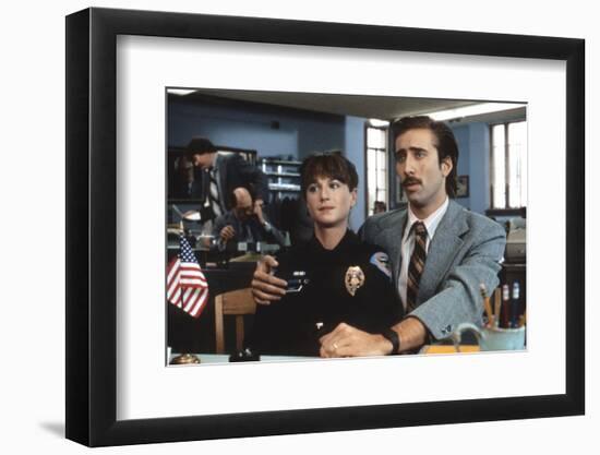 Arizona Junior RAISING ARIZONA by Joel Coen and Ethan Coen with Holly Hunter and Nicolas Cage, 1987-null-Framed Photo