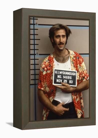 Arizona Junior RAISING ARIZONA by Joel Coen and Ethan Coen with Nicolas Cage, 1987 (photo)-null-Framed Stretched Canvas