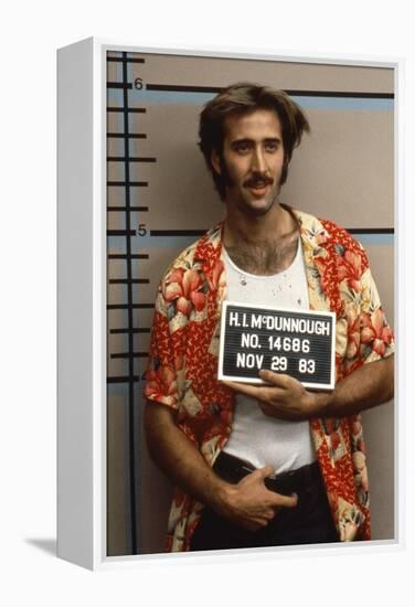 Arizona Junior RAISING ARIZONA by Joel Coen and Ethan Coen with Nicolas Cage, 1987 (photo)-null-Framed Stretched Canvas