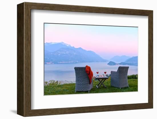 Armchairs and red wine with views of Lake Como at sunset, Lombardy, Italian Lakes, Italy-Simon Montgomery-Framed Photographic Print