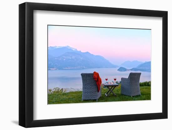 Armchairs and red wine with views of Lake Como at sunset, Lombardy, Italian Lakes, Italy-Simon Montgomery-Framed Photographic Print