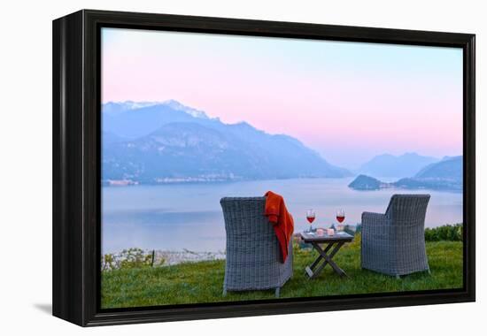 Armchairs and red wine with views of Lake Como at sunset, Lombardy, Italian Lakes, Italy-Simon Montgomery-Framed Premier Image Canvas