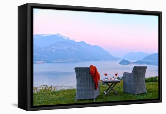 Armchairs and red wine with views of Lake Como at sunset, Lombardy, Italian Lakes, Italy-Simon Montgomery-Framed Premier Image Canvas