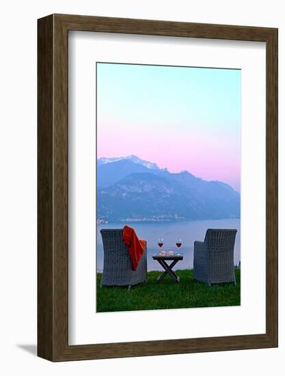 Armchairs and red wine with views of Lake Como at sunset, Lombardy, Italian Lakes, Italy-Simon Montgomery-Framed Photographic Print