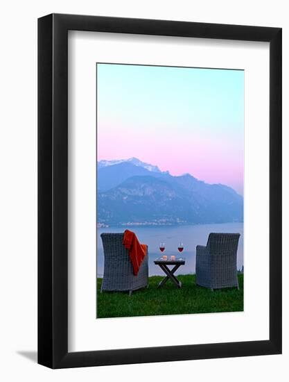 Armchairs and red wine with views of Lake Como at sunset, Lombardy, Italian Lakes, Italy-Simon Montgomery-Framed Photographic Print