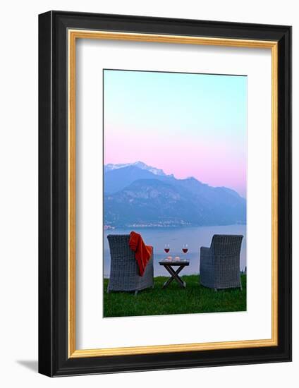 Armchairs and red wine with views of Lake Como at sunset, Lombardy, Italian Lakes, Italy-Simon Montgomery-Framed Photographic Print