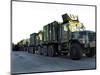 Armored Trucks Sit on the Pier at Morehead City, North Carolina, Awaiting Deployment-null-Mounted Photographic Print