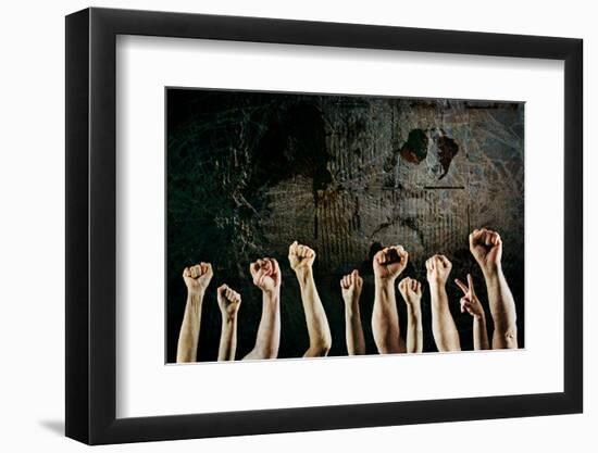 Arms Raised in Protest on a Grunge Background-soupstock-Framed Photographic Print