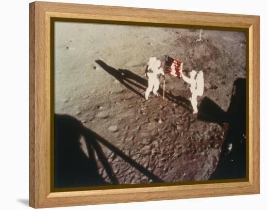 Armstrong and Aldrin Unfurl the Us Flag on the Moon, 1969-null-Framed Premier Image Canvas