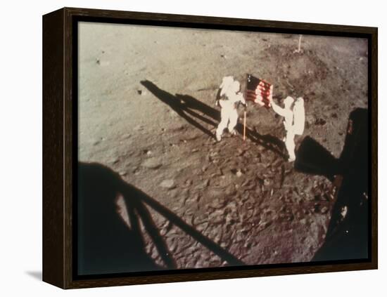 Armstrong and Aldrin Unfurl the Us Flag on the Moon, 1969-null-Framed Premier Image Canvas