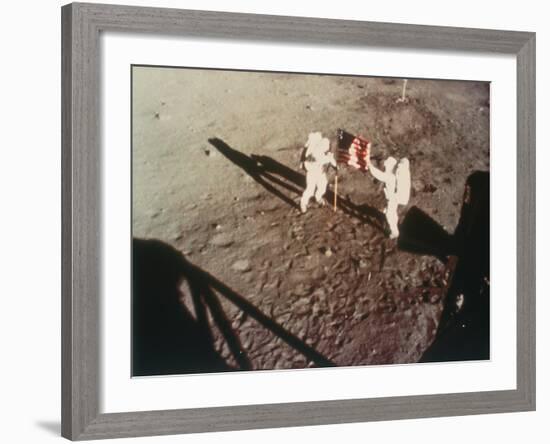 Armstrong and Aldrin Unfurl the Us Flag on the Moon, 1969-null-Framed Photographic Print