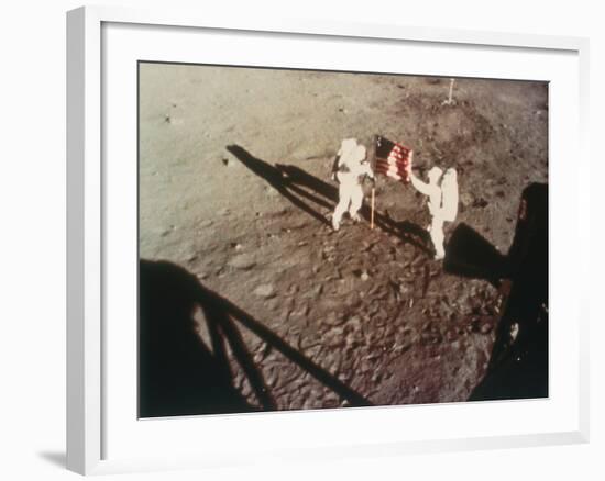 Armstrong and Aldrin Unfurl the Us Flag on the Moon, 1969-null-Framed Photographic Print