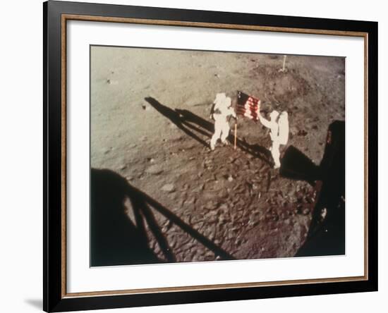 Armstrong and Aldrin Unfurl the Us Flag on the Moon, 1969-null-Framed Photographic Print