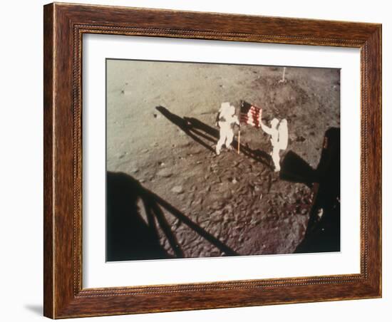 Armstrong and Aldrin Unfurl the Us Flag on the Moon, 1969-null-Framed Photographic Print