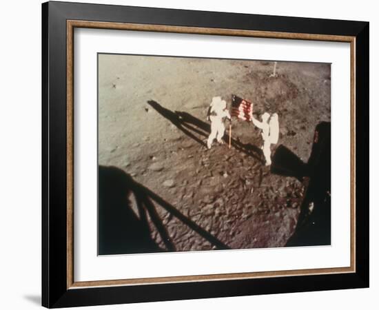 Armstrong and Aldrin Unfurl the Us Flag on the Moon, 1969-null-Framed Photographic Print