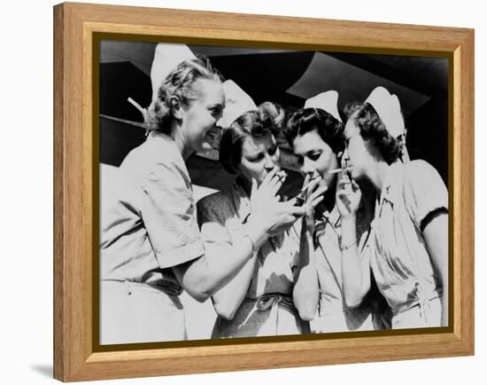 Army Nurses Lighting Up their Cigarettes in 1947-null-Framed Stretched Canvas