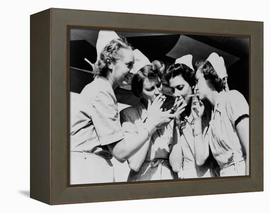 Army Nurses Lighting Up their Cigarettes in 1947-null-Framed Stretched Canvas