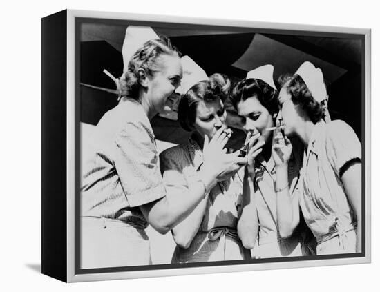 Army Nurses Lighting Up their Cigarettes in 1947-null-Framed Stretched Canvas