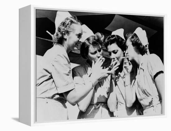 Army Nurses Lighting Up their Cigarettes in 1947-null-Framed Stretched Canvas