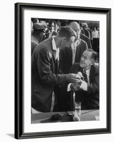 Arnold Palmer, Bobby Jones, Spectator at Masters' Tournament Play-Off-null-Framed Premium Photographic Print