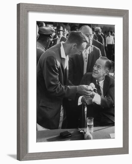 Arnold Palmer, Bobby Jones, Spectator at Masters' Tournament Play-Off-null-Framed Premium Photographic Print