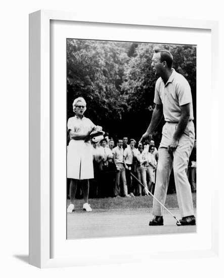 Arnold Palmer, Reacting to a Missed Put at the Westchester Country Club in 1964-null-Framed Photo