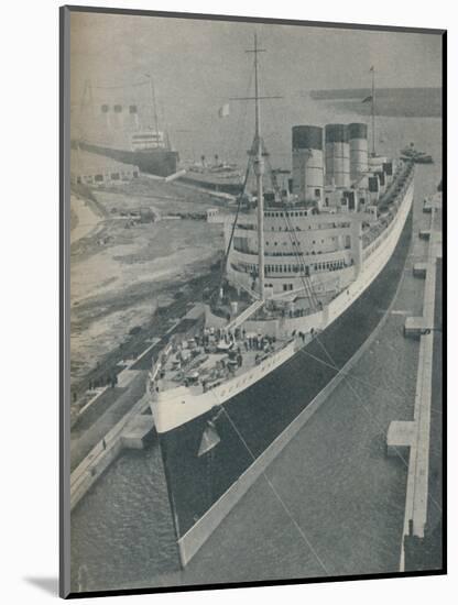 'Arrival of RMS Cunard White Star liner Queen Mary in King George V Graving Dock', 1936-Unknown-Mounted Photographic Print