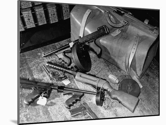 Arsenal of Machine Guns, Pistols, Shotguns Etc.- Belongs to Recently Captured Frank Dailey and Gang-Carl Mydans-Mounted Photographic Print