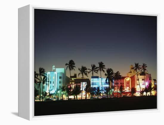 Art Deco Hotels at Dusk, Miami Beach, Florida, USA-Walter Bibikow-Framed Premier Image Canvas