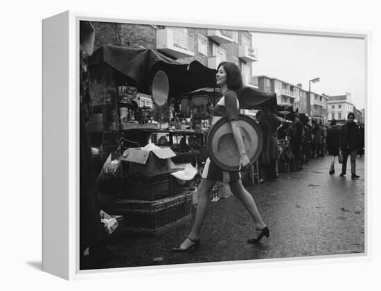 Art Director Jeanette Collins wears latest fashion while strolling through Portobello Road-Carlo Bavagnoli-Framed Premier Image Canvas