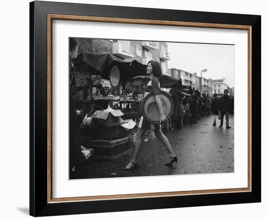 Art Director Jeanette Collins wears latest fashion while strolling through Portobello Road-Carlo Bavagnoli-Framed Photographic Print