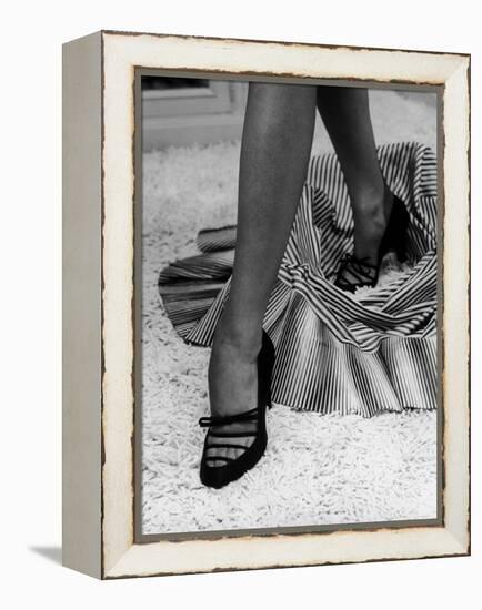 Artful Shot of Model Showing Off a Pair of High Heel Shoes-Nina Leen-Framed Premier Image Canvas