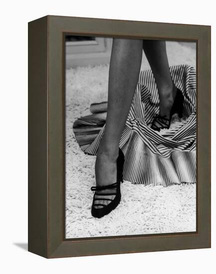 Artful Shot of Model Showing Off a Pair of High Heel Shoes-Nina Leen-Framed Premier Image Canvas