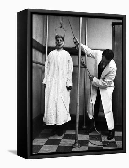 Arthritis Patient Being Treated with Stretching Device at Clinic-Alfred Eisenstaedt-Framed Premier Image Canvas