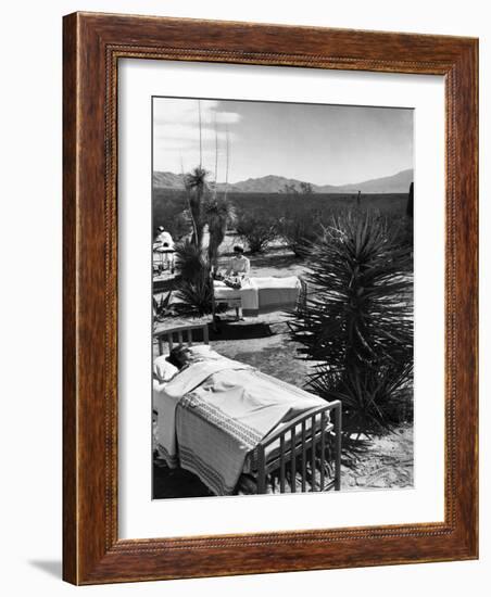 Arthritis Patients Being Tended to by Nurses as They Undergo Sunbathing Treatment at Desert Clinic-Alfred Eisenstaedt-Framed Photographic Print