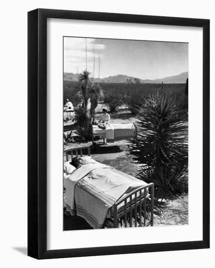 Arthritis Patients Being Tended to by Nurses as They Undergo Sunbathing Treatment at Desert Clinic-Alfred Eisenstaedt-Framed Photographic Print